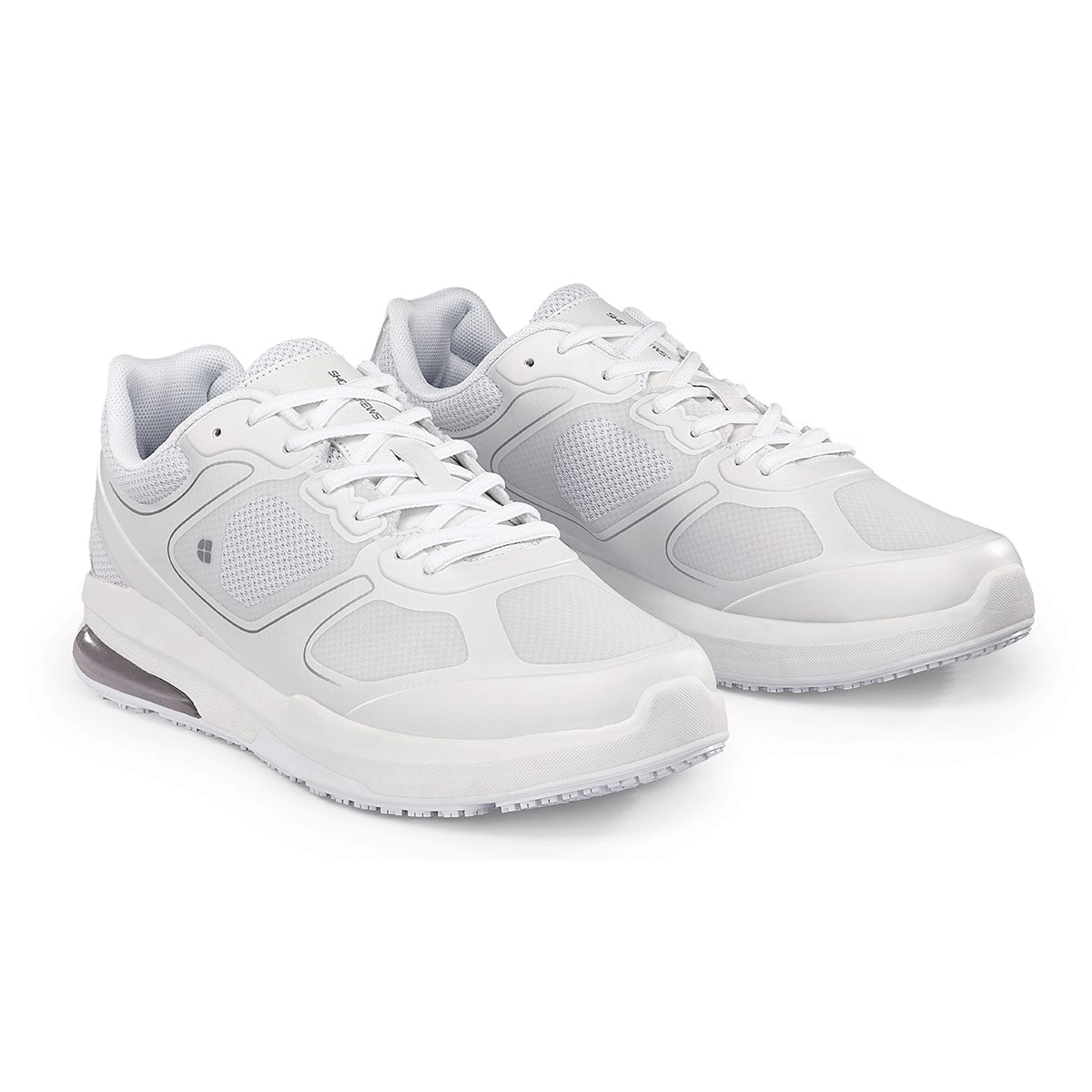The Evolution II White from Shoes For Crews are slip-resistant and water-resistant trainers, pair seen in profile on the right.