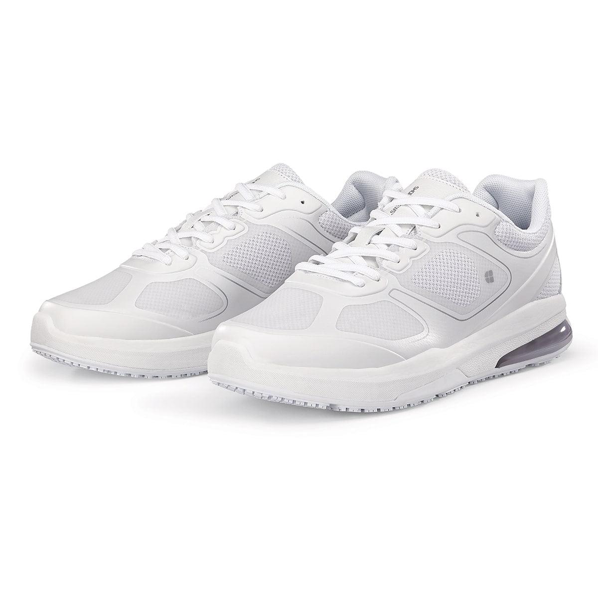 The Evolution II White from Shoes For Crews are slip-resistant and water-resistant trainers, pair seen in profile on the left.