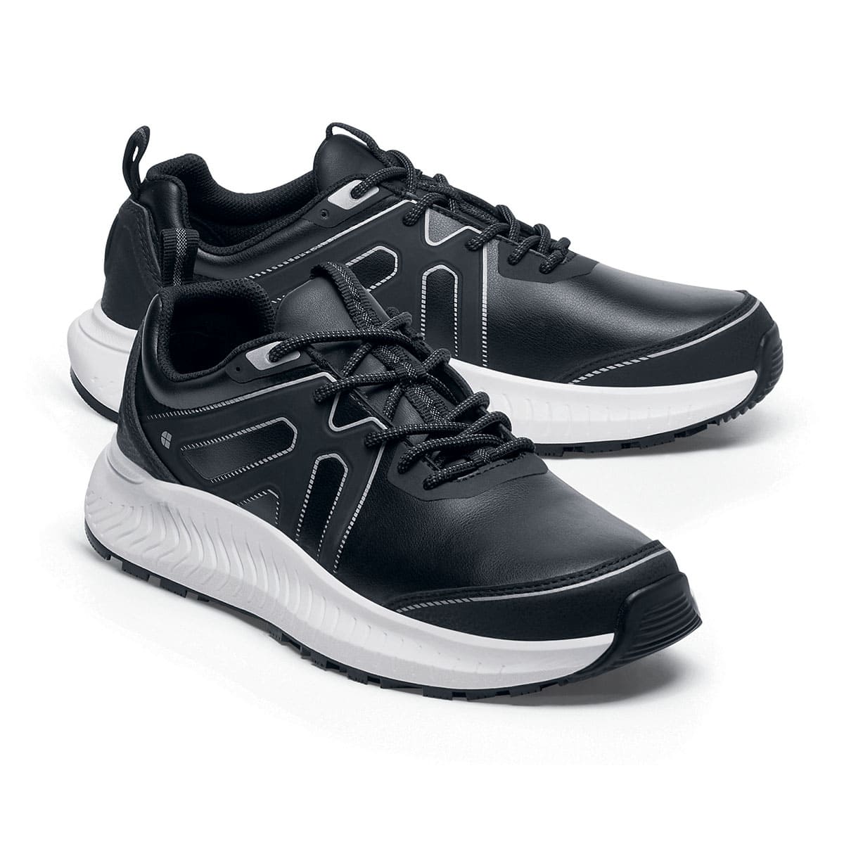 The Colly Soft Toe from Shoes For Crews are slip-resistant shoes that offer superior TripGuard technology, a water-resistant upper and arch support, pair seen from the right side, emphasised on the tip of the right shoe.