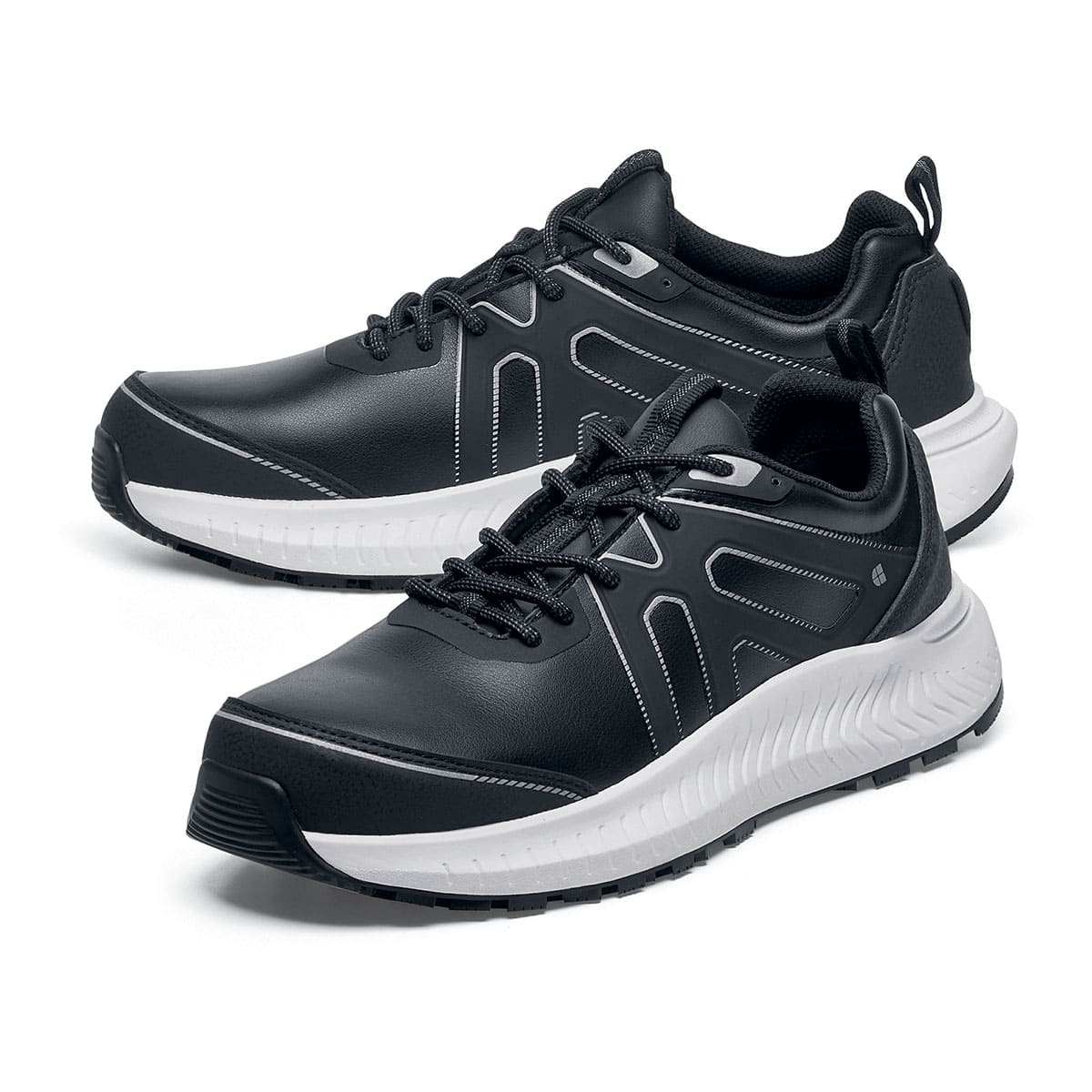 The Colly Soft Toe from Shoes For Crews are slip-resistant shoes that offer superior TripGuard technology, a water-resistant upper and arch support, pair seen from the left side, emphasised on the tip of the left shoe.