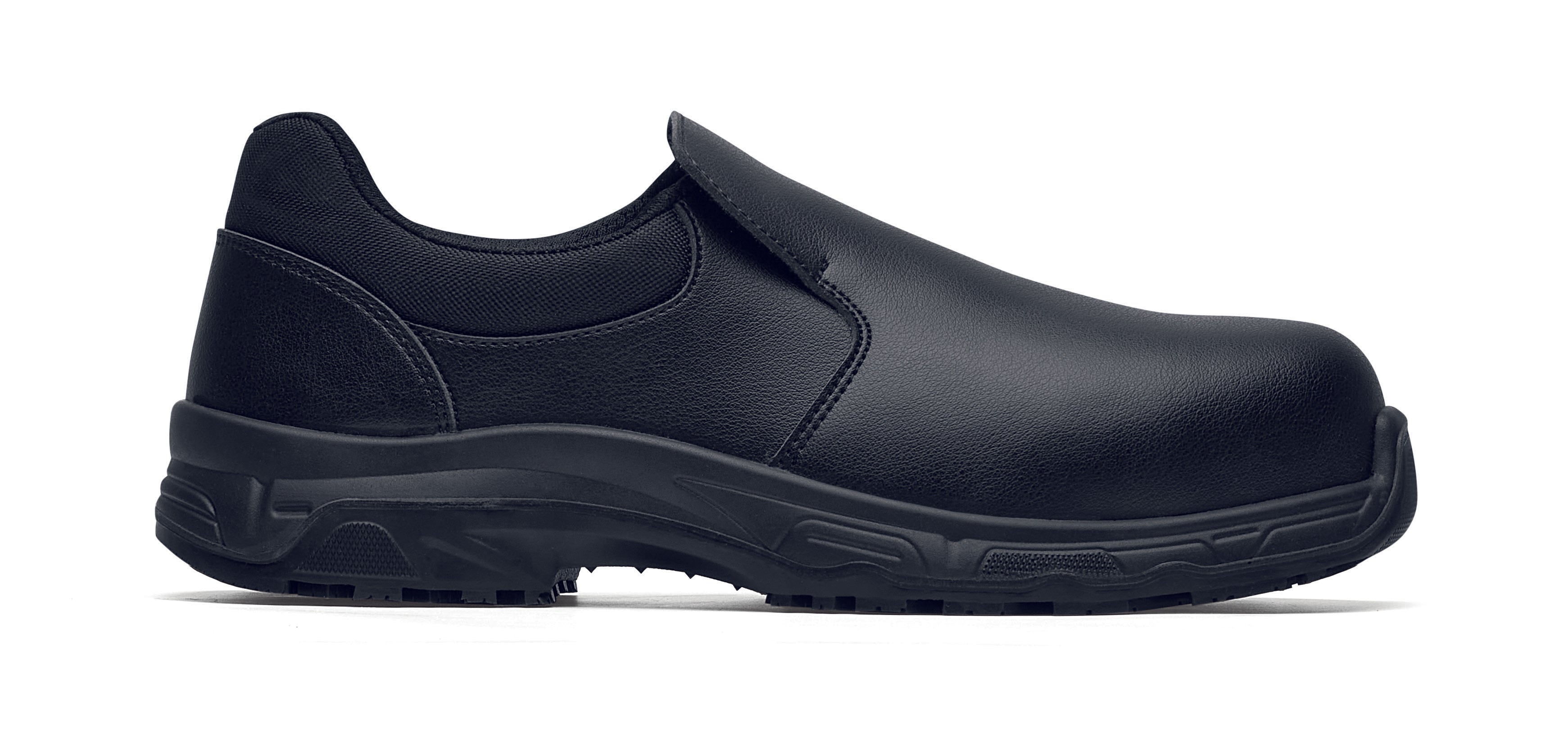 The Catania Black from Shoes For Crews, made in Italy, is a slip-resistant shoe with a composite safety toe cap and a puncture-resistant midsole, seen from the right.