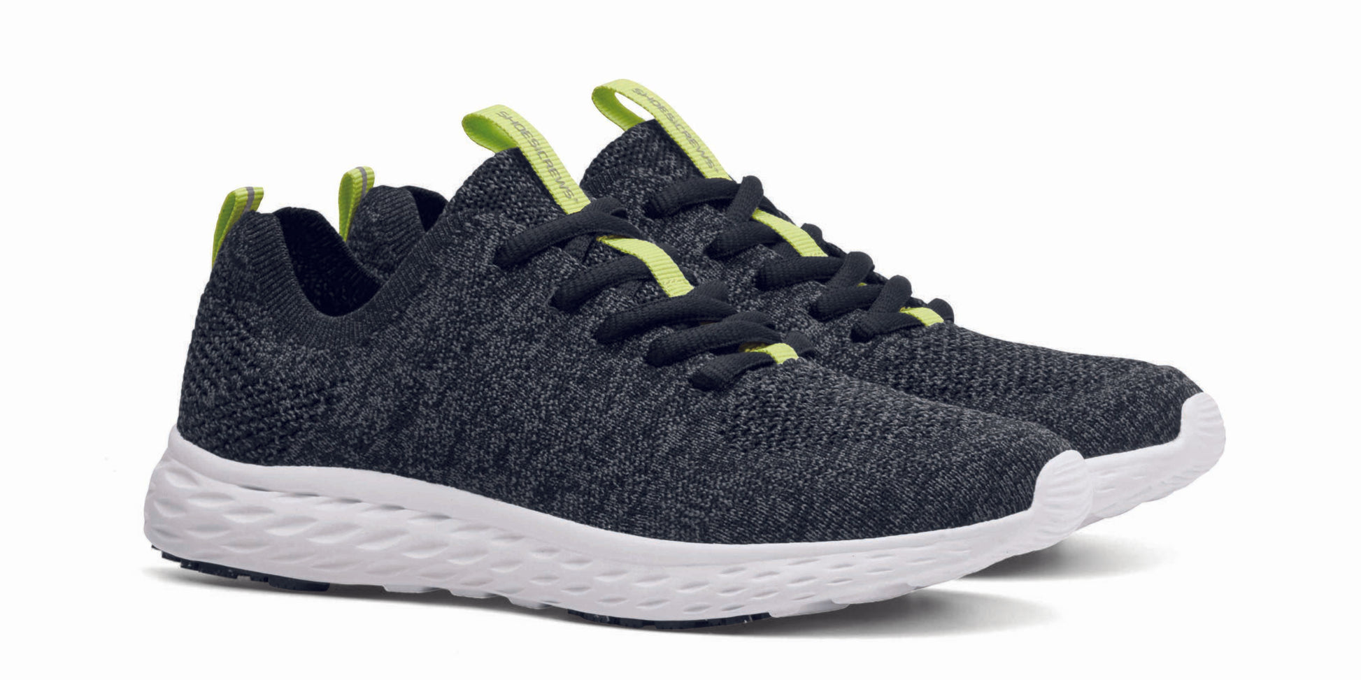 The Everlight™ ECO Womens Black/Grey from Shoes For Crews are lightweight, breathable slip-resistant trainers made from recycled materials,  pair seen in profile on the right.