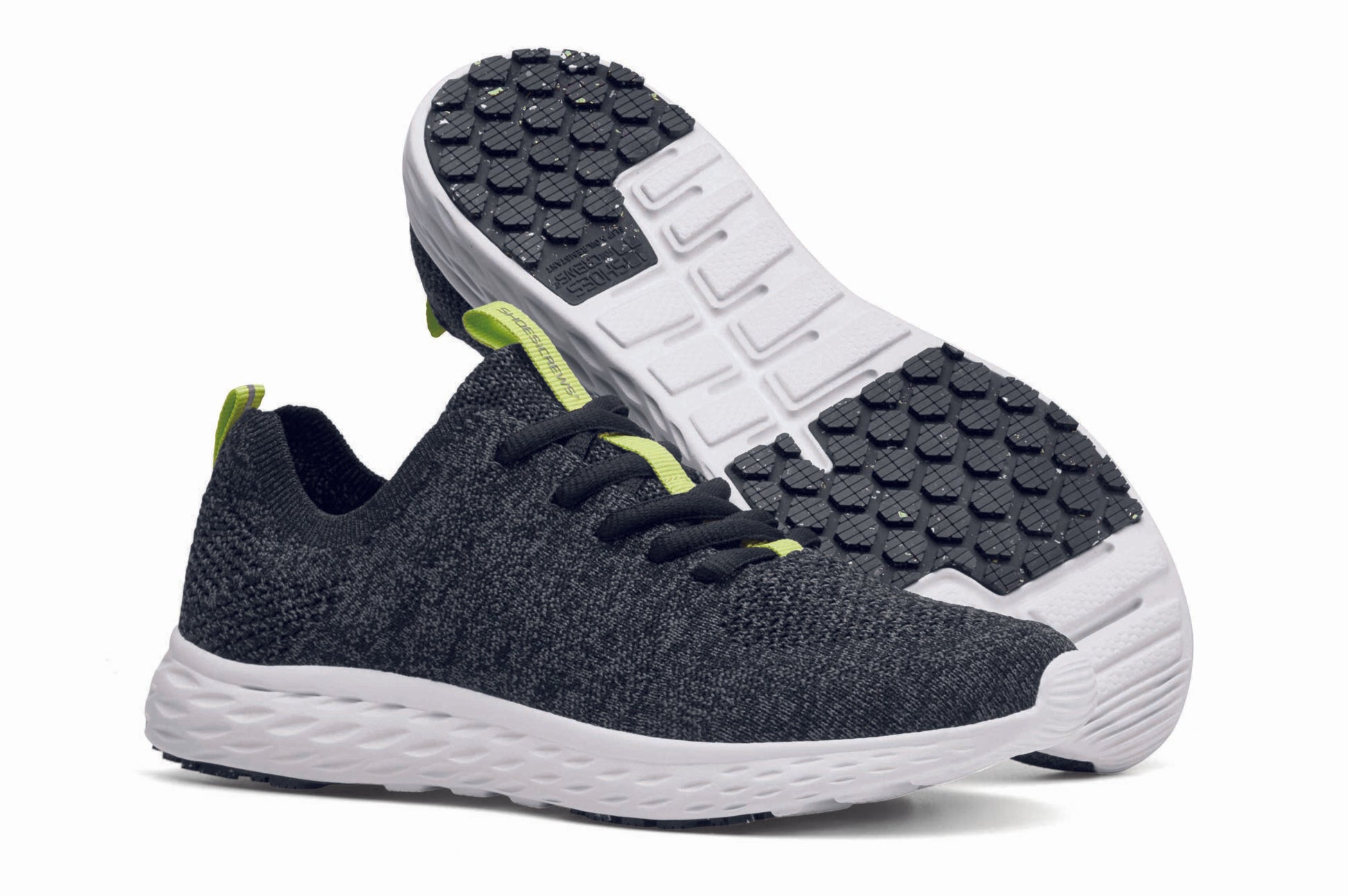 The Everlight™ ECO Womens Black/Grey from Shoes For Crews are lightweight, breathable slip-resistant trainers made from recycled materials,  pair seen from the right side and the sole.