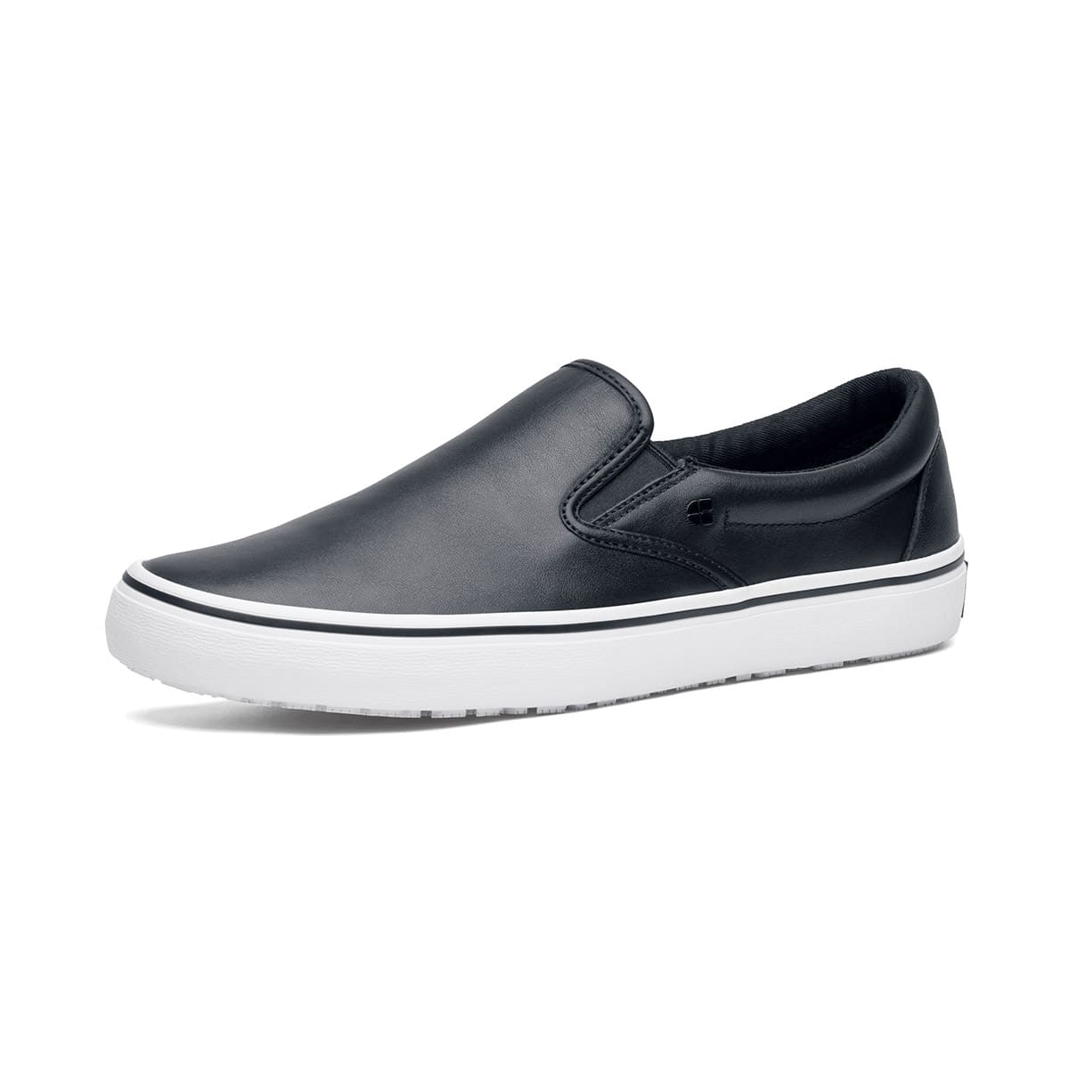 The Merlin Slip On Black and White from Shoes For Crews are slip-on trainers that are slip-resistant, lightweight, easy to clean and water-resistant, seen from the left profile.