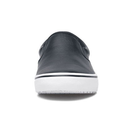 The Merlin Slip On Black and White from Shoes For Crews are slip-on trainers that are slip-resistant, lightweight, easy to clean and water-resistant, seen from the front.