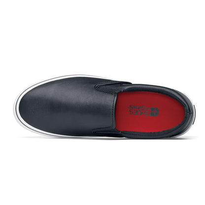 The Merlin Slip On Black and White from Shoes For Crews are slip-on trainers that are slip-resistant, lightweight, easy to clean and water-resistant, seen from above.